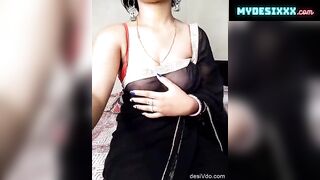 Sexy bhabhi in see through black saree without blouse exposing boobs cam show