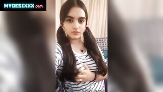 Cute girl showing and pressing big boobs