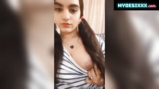 Cute girl showing and pressing big boobs