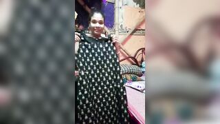 Sexy girl try her new sexy black dress on live show