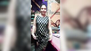 Sexy girl try her new sexy black dress on live show