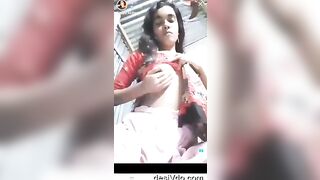 Village girl showing off her big boobs with pointed nipples