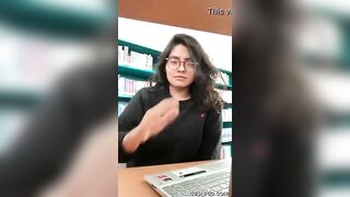 Girl sitting in library showed her big boobs