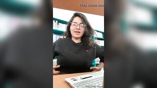Girl sitting in library showed her big boobs