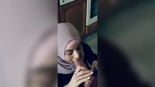 Horny hijab girl sucking big cock with pleasure